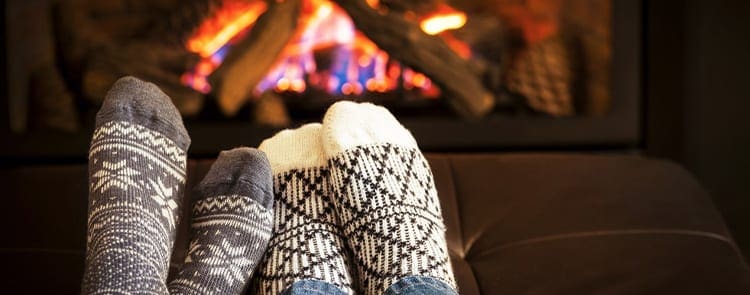 feet near fireplace